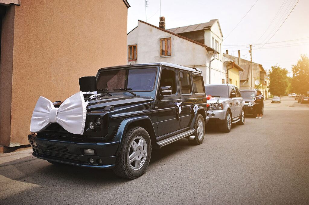 Polished black luxury SUV prepared for a wedding or executive event in Kigali