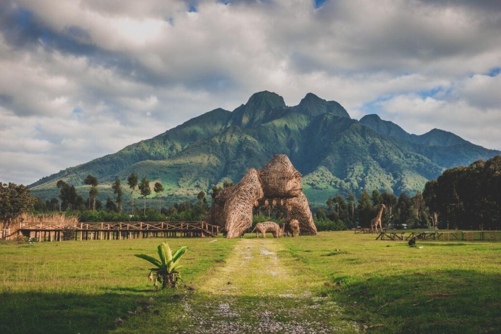 Misty Virunga volcanoes rising above farmland near Volcanoes National Park, Rwanda